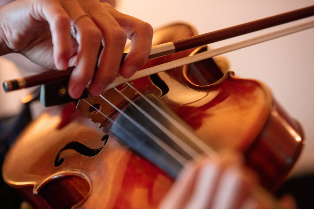 violinist bowing up close